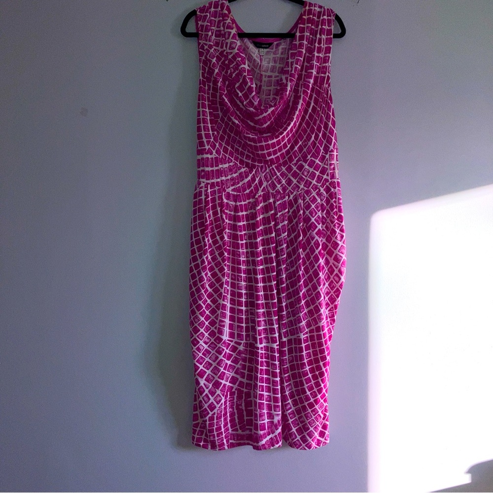 Anna Schulz pretty in pink, lovely sleeveless dress which has a shawl front